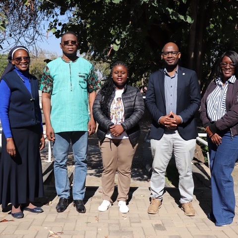 JCTR ED and staff pose for a group photo with a Save the Children delegation led by SOME Allain Kounsovin, Regional Programme Manager for Burkina Faso and Ivory Coast